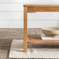 Ravenscroft Modern Boho Acacia Wood Slatted Outdoor Coffee Table With Lower Shelf - Saracina Home 19 Ravenscroft Modern Boho Acacia Wood Slatted Outdoor Coffee Table With Lower Shelf - Saracina Home -Living Room Furniture Store GUEST 20e8c058 29f7 4dae 9c40 ba829a75f9e4