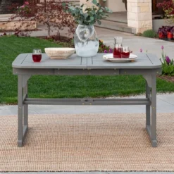 Ravenscroft Modern Boho Acacia Wood Slat Top Rectangle Extendable Outdoor Table - Saracina Home 18 Ravenscroft Modern Boho Acacia Wood Slat Top Rectangle Extendable Outdoor Table - Saracina Home -Living Room Furniture Store GUEST 3fec749b 7c7e 4842 a9d7 7206a137f8a5