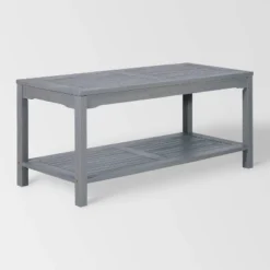 Ravenscroft Modern Boho Acacia Wood Slatted Outdoor Coffee Table With Lower Shelf - Saracina Home 25 Ravenscroft Modern Boho Acacia Wood Slatted Outdoor Coffee Table With Lower Shelf - Saracina Home -Living Room Furniture Store GUEST b82362d2 34f0 4dc8 b530 c4b76868ed3f